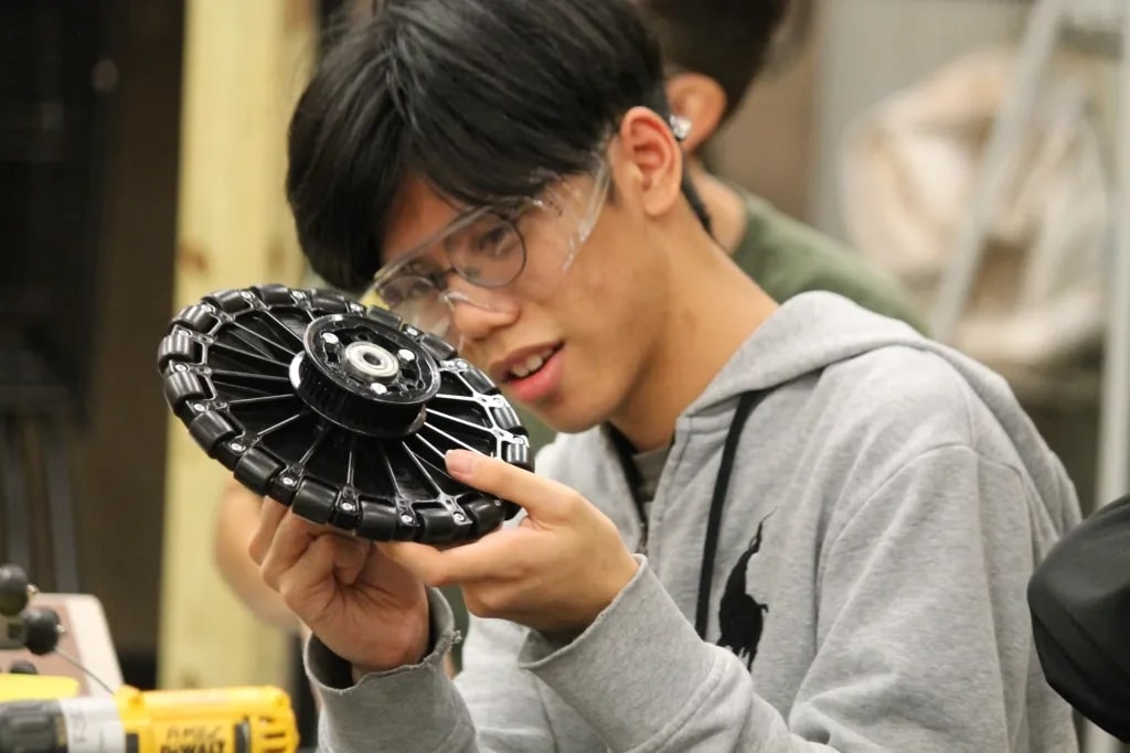 A student working on a part