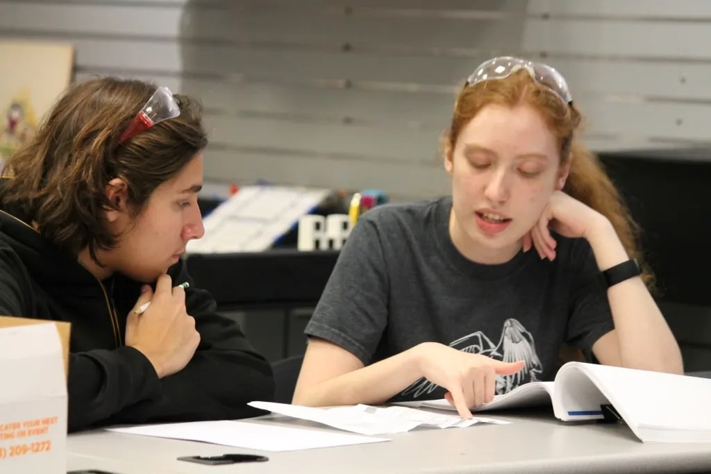 A Mentor helping a student